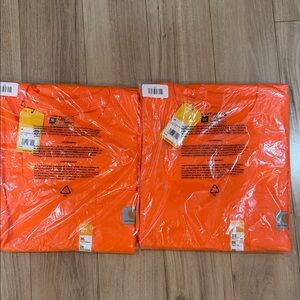 2 brand new in plastic men’s Carhartt shirts